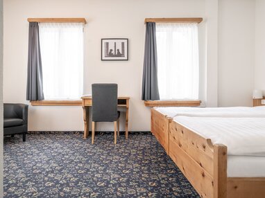 Zimmerstandard Doppelzimmer Economy einfach und schlicht. | © Davos Klosters Mountains
