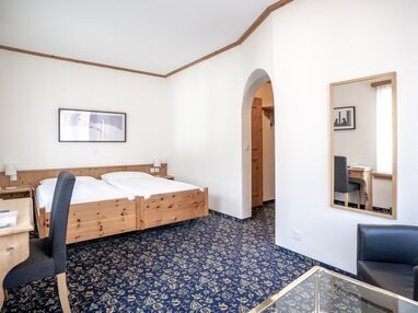 Zimmerstandard Doppelzimmer Economy einfach und schlicht. | © Davos Klosters Mountains