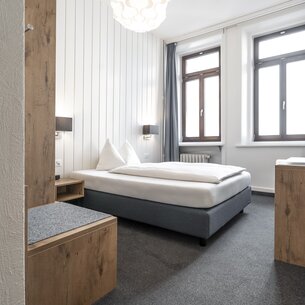Schlicht eingerichtetes Einzelzimmer im Hotel Ochsen. | © Davos Klosters Mountains